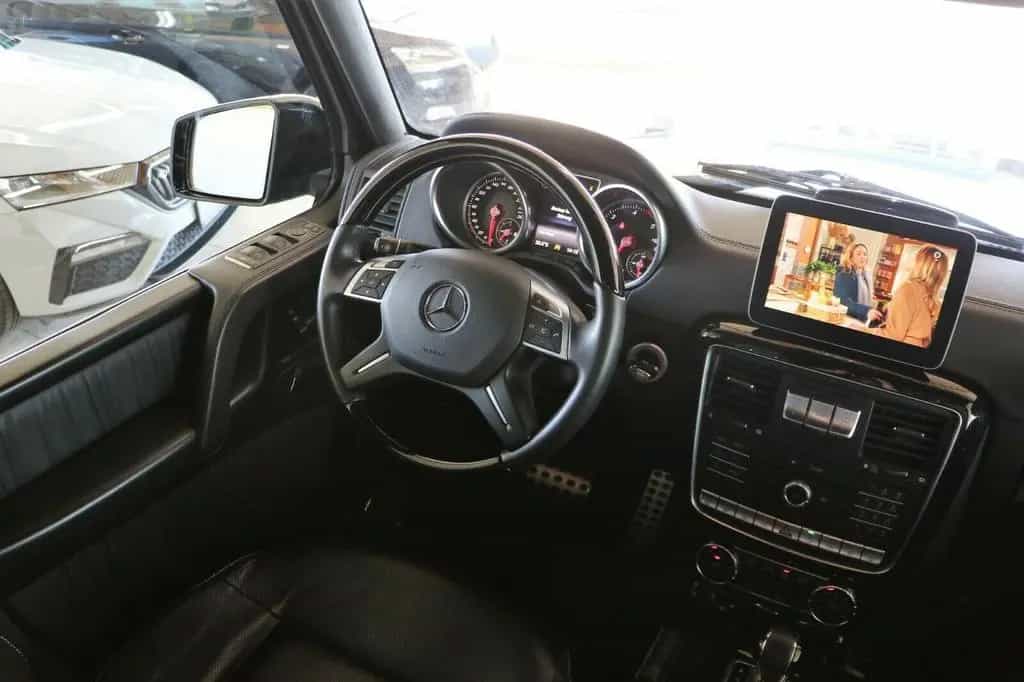 Mercedes-Benz G 350 d Designo Exclusiv Sthz TV Rear Seat Night 07/2017-photo-14