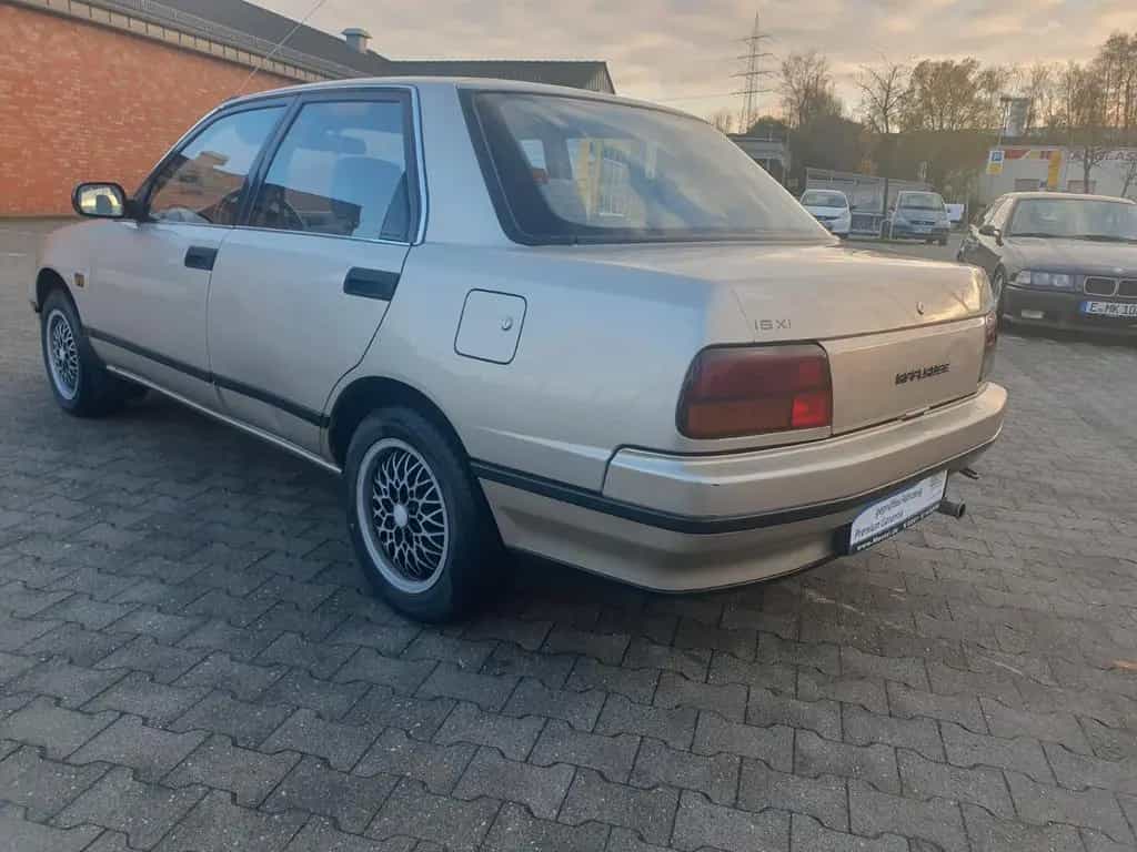 Daihatsu Applause 1.6 1 HAND erst 87158 km H-KENNZEICHEN 04/1990-photo-5