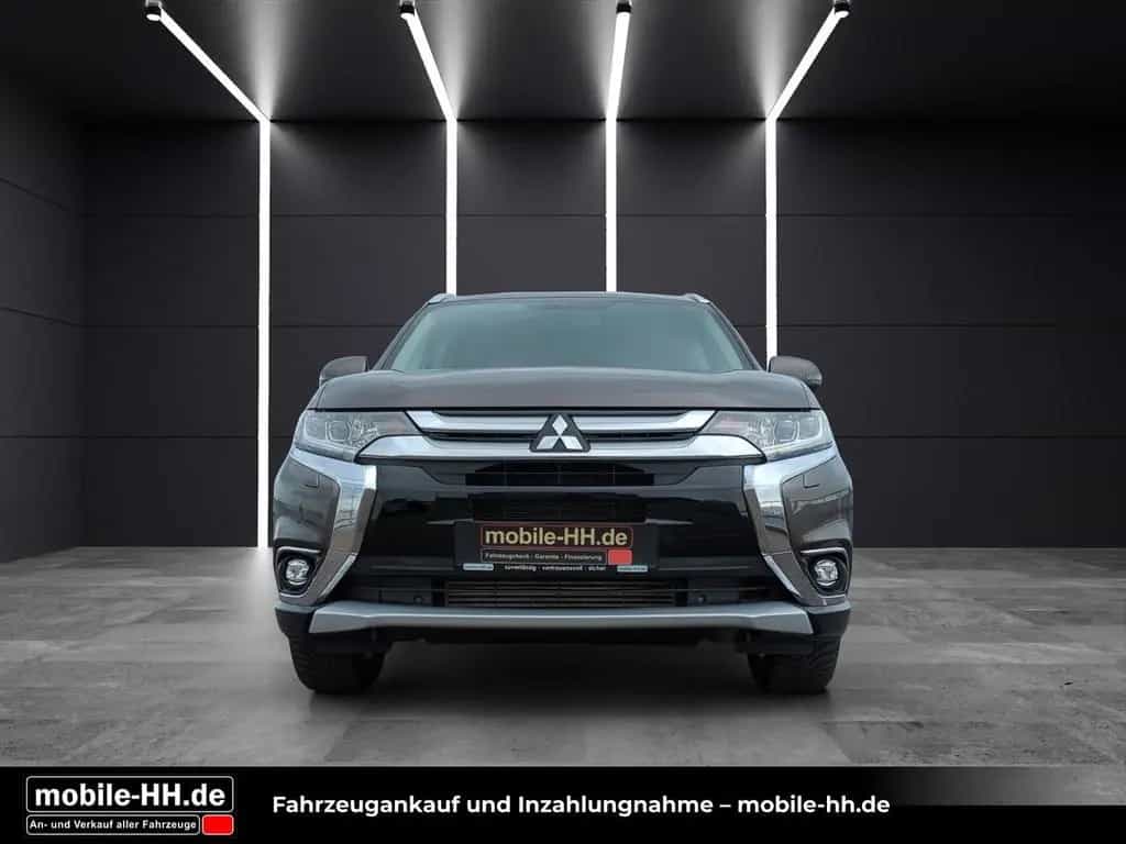 Mitsubishi Outlander Top 4WD*SD*LEDER*XENON*AHK*7SITZER* 02/2018-photo-1