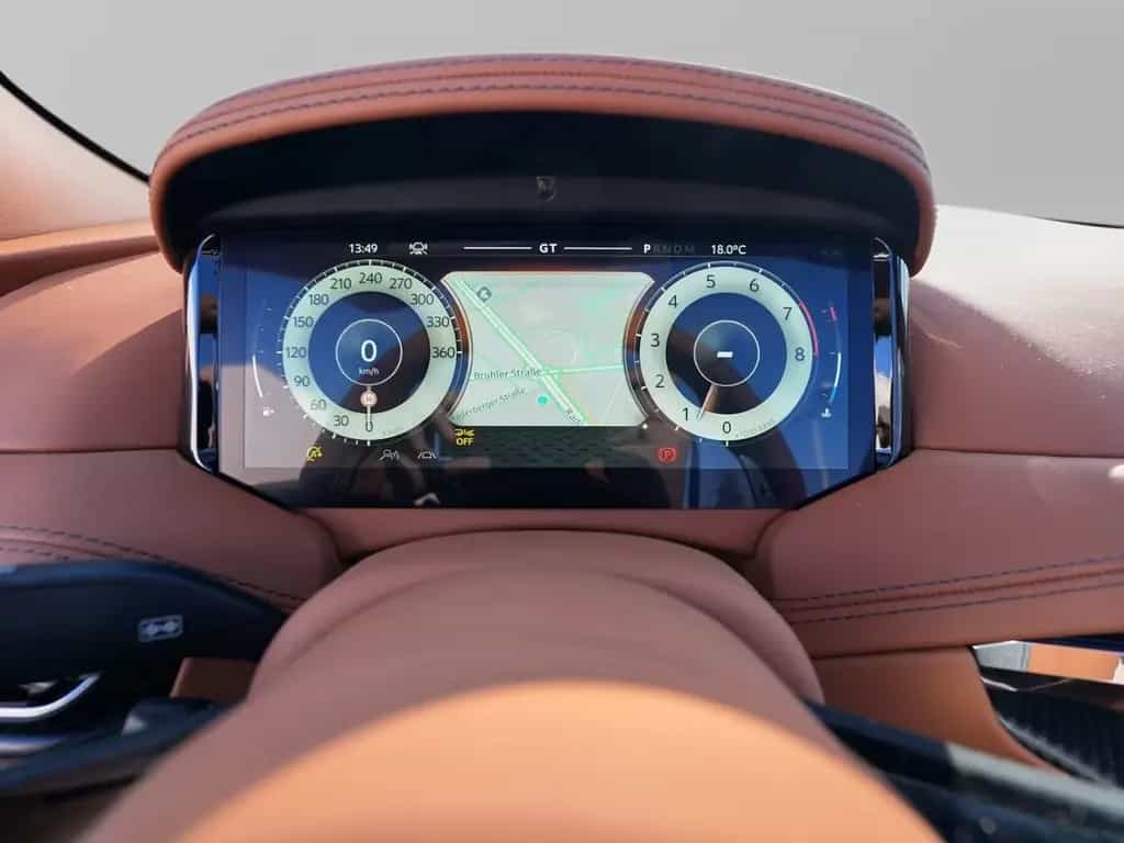 Aston Martin DB12 Volante Titanium Grey / Q- Centenary Saddle 03/2025-photo-34