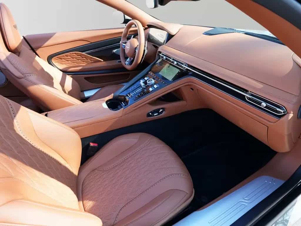 Aston Martin DB12 Volante Titanium Grey / Q- Centenary Saddle 03/2025-photo-40