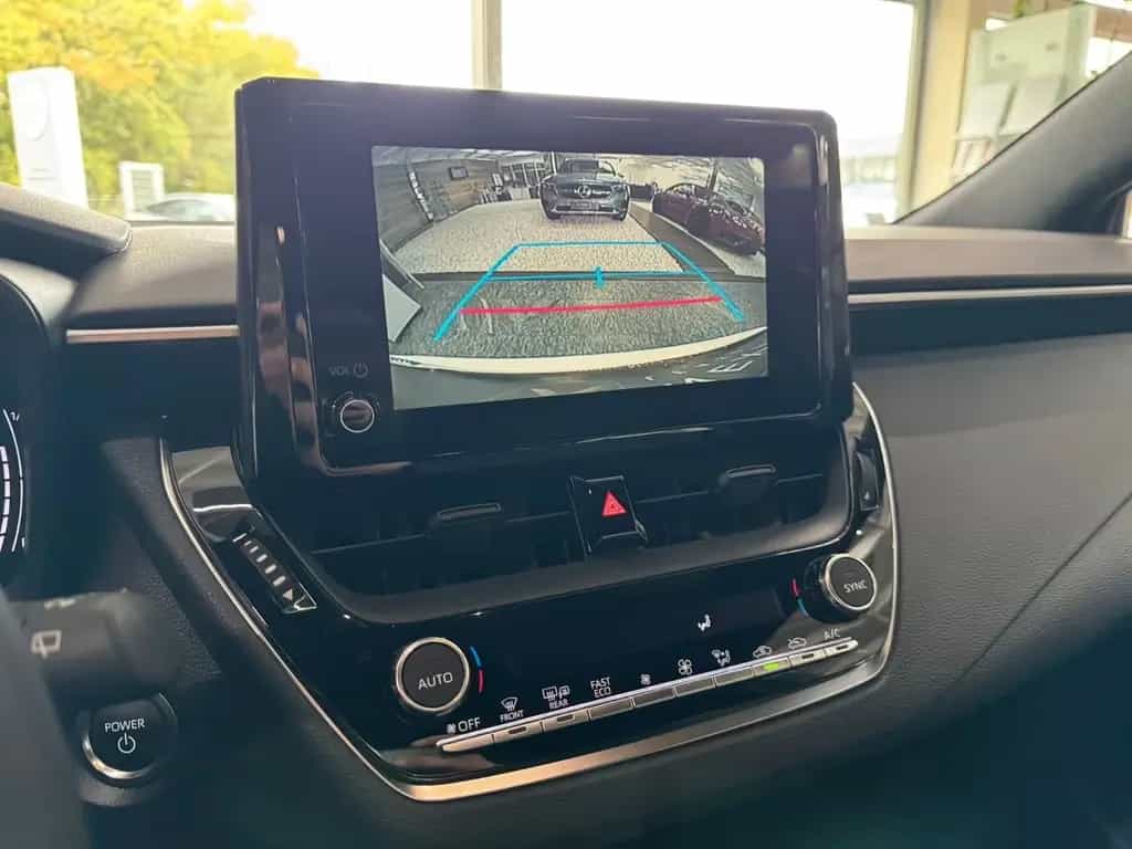 Toyota Corolla 1.8 PHEV Tou Sport B&W NAVI LED SHZ ACC 09/2025-photo-11