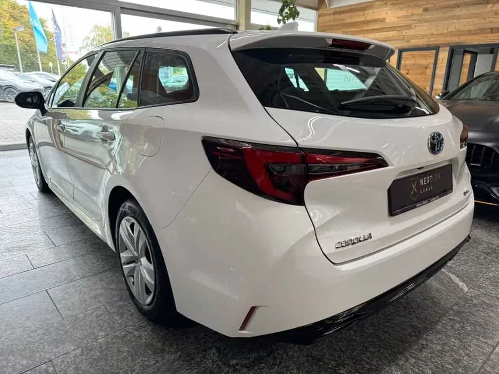 Toyota Corolla 1.8 PHEV Tou Sport B&W NAVI LED SHZ ACC 09/2025-photo-5