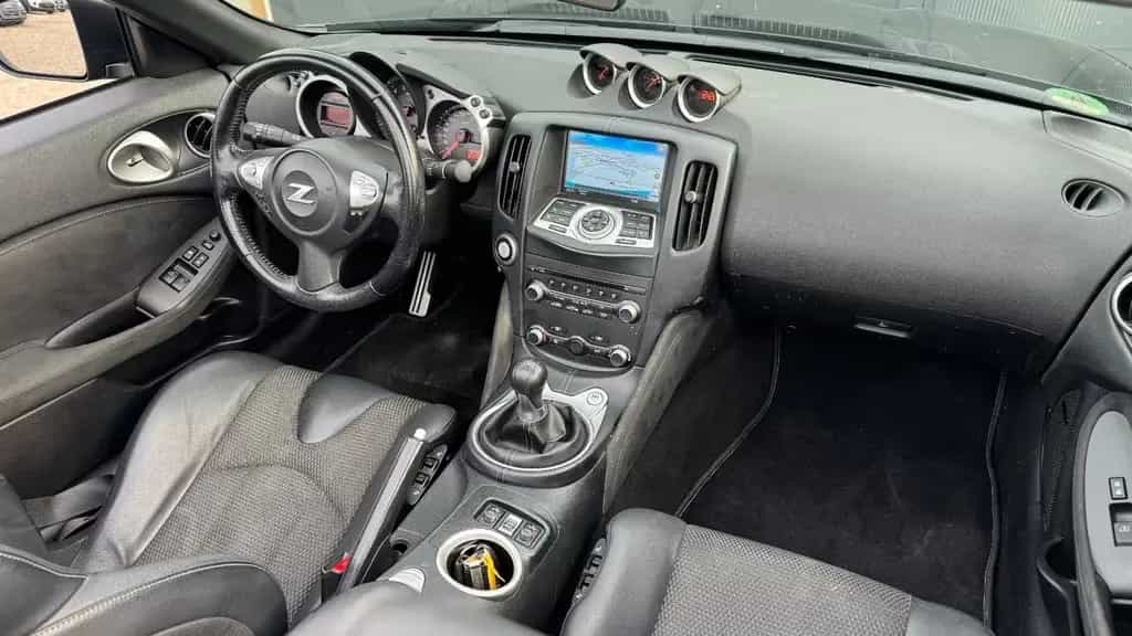 Nissan 370Z Roadster *SCHALTER*BOSE*NAVI*SHZ*2.HAND* 05/2016-photo-11