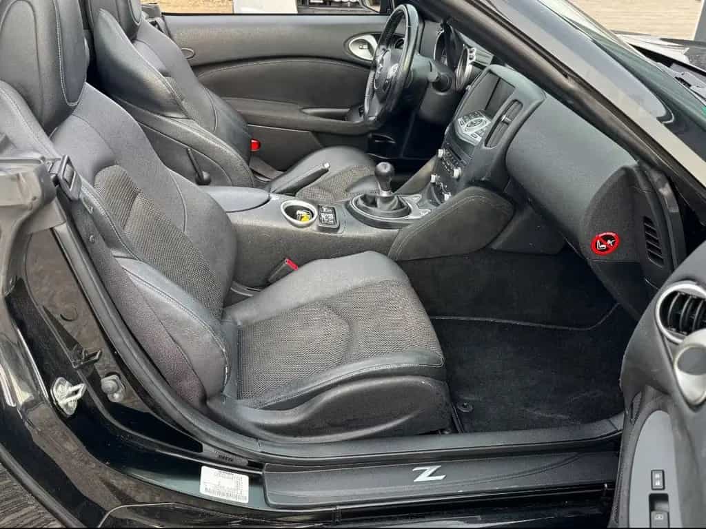 Nissan 370Z Roadster *SCHALTER*BOSE*NAVI*SHZ*2.HAND* 05/2016-photo-13