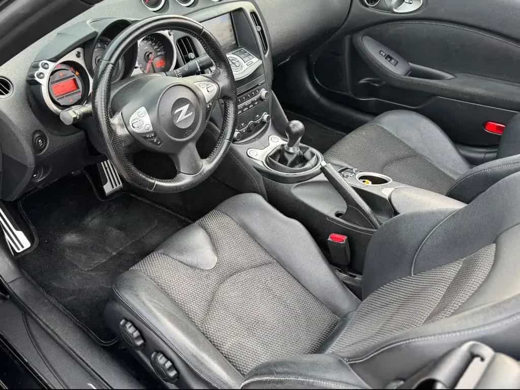 Nissan 370Z Roadster *SCHALTER*BOSE*NAVI*SHZ*2.HAND* 05/2016-photo-9