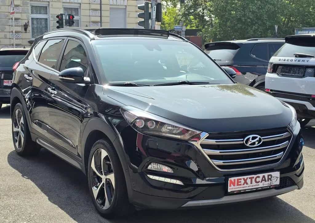 Hyundai TUCSON 1.6 Premium 4WD|Auto|Pano|Kamera|Leder|Bo 04/2017-photo-1