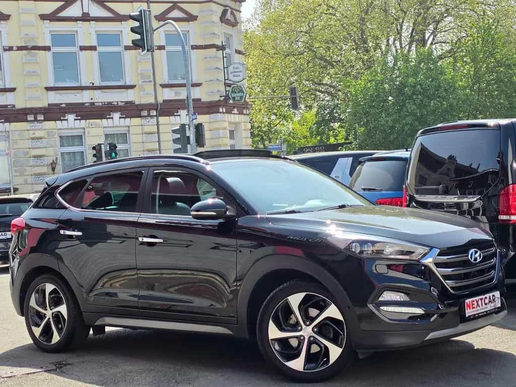 Hyundai TUCSON 1.6 Premium 4WD|Auto|Pano|Kamera|Leder|Bo 04/2017-photo-7