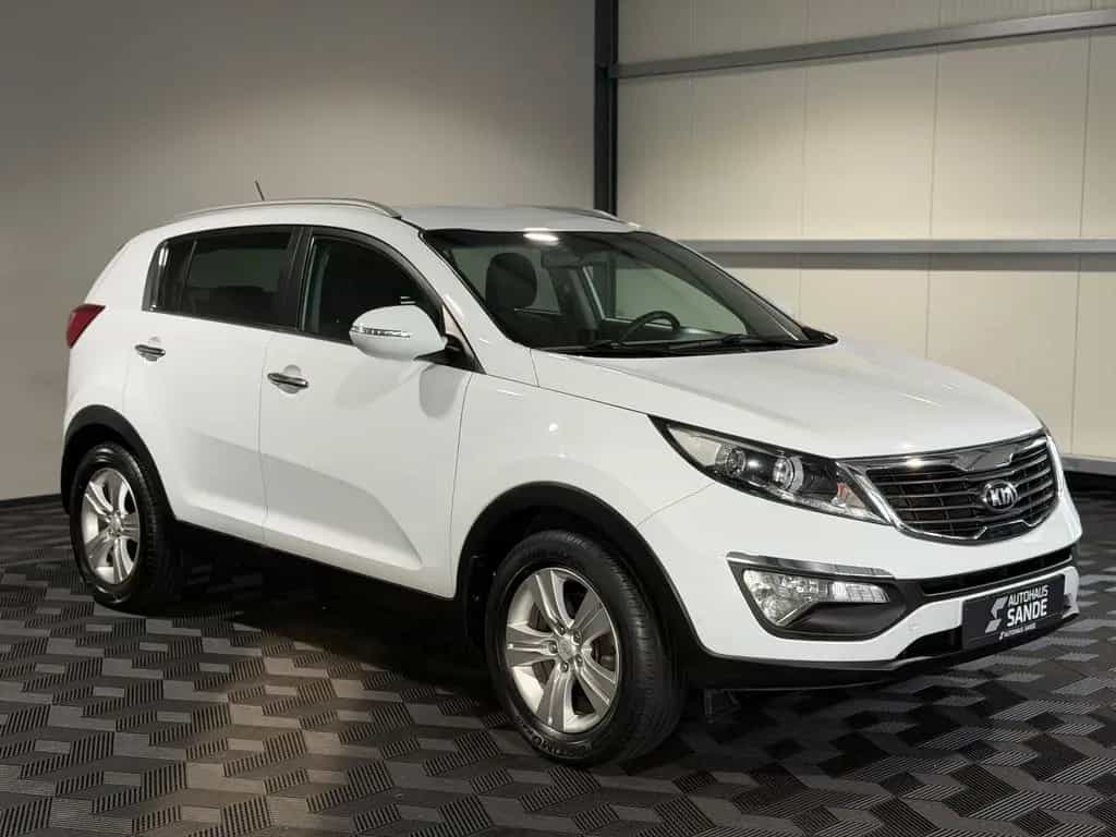 Kia Sportage Spirit 2WD *PDC*SHZ*KLIMAAUTO.*TÜV NEU* 04/2013-photo-1