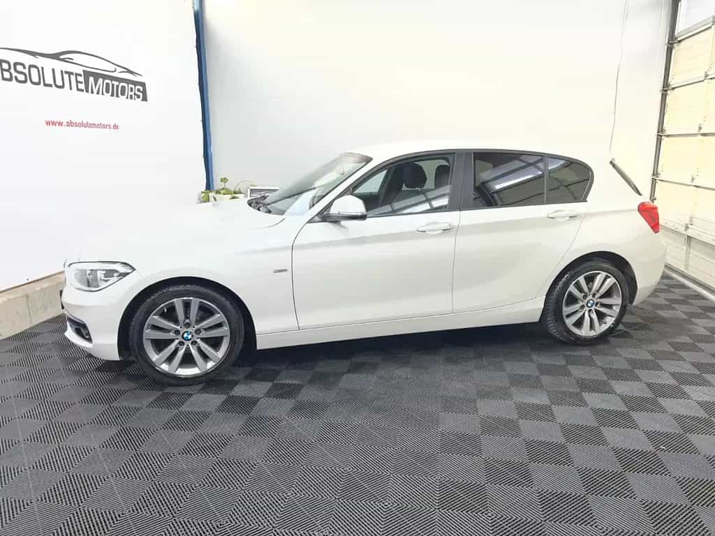 BMW 116 i Sport Line *LED-SW *Navi *Garantie 02/2018-photo-1