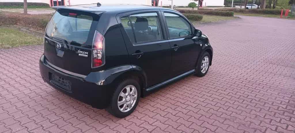 Daihatsu Sirion 1.5 S,8XRäder,Klima,TÜV 02.27 09/2007-photo-1