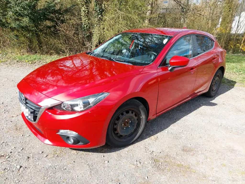 Mazda 3 Limosine Center-line 02/2014-photo-0