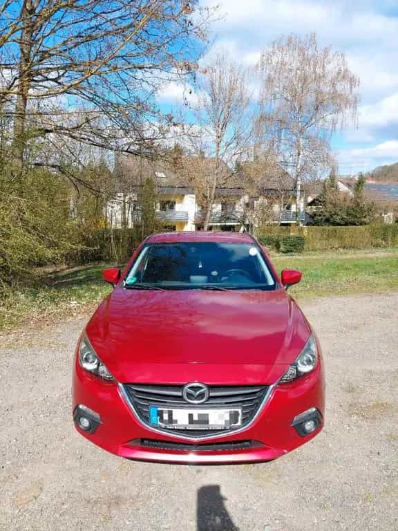 Mazda 3 Limosine Center-line 02/2014-photo-1