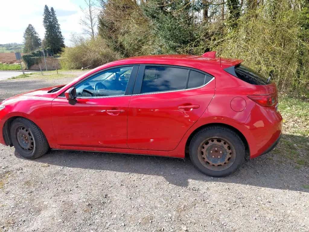 Mazda 3 Limosine Center-line 02/2014-photo-3
