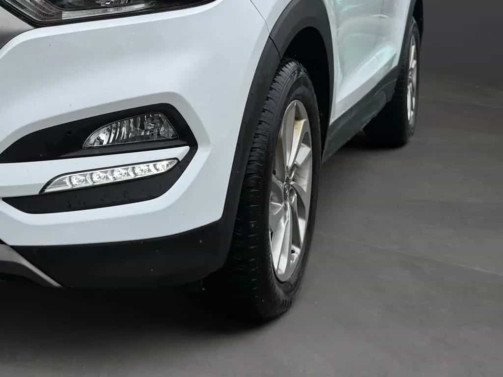 Hyundai TUCSON 1.6 T-GDI Autom. 25 Jahre 4WD AWD PDC AUX 04/2016-photo-7