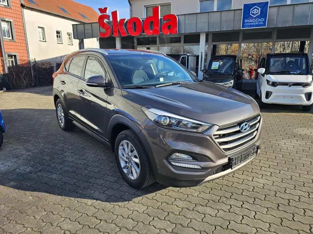 Hyundai TUCSON blue 1.6 GDi 2WD Trend+NAVI+AHK+2.HAND+ 05/2016-photo-1