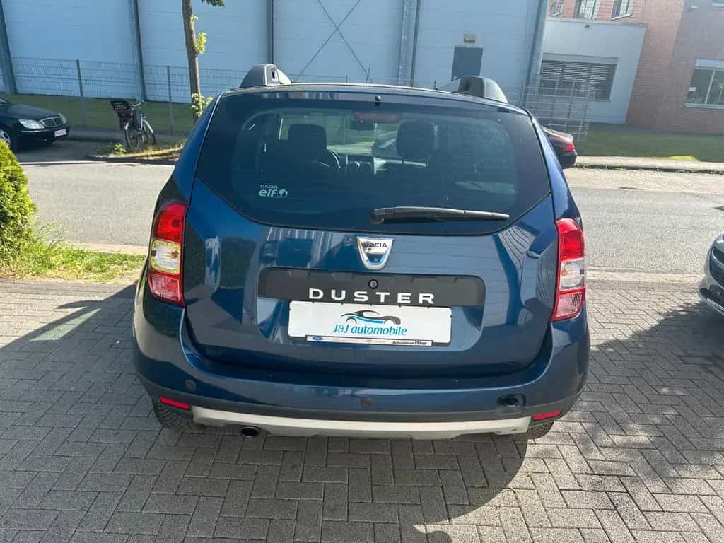 Dacia Duster I Celebration 4x2 * 1 Hand* Garantie 10/2015-photo-3