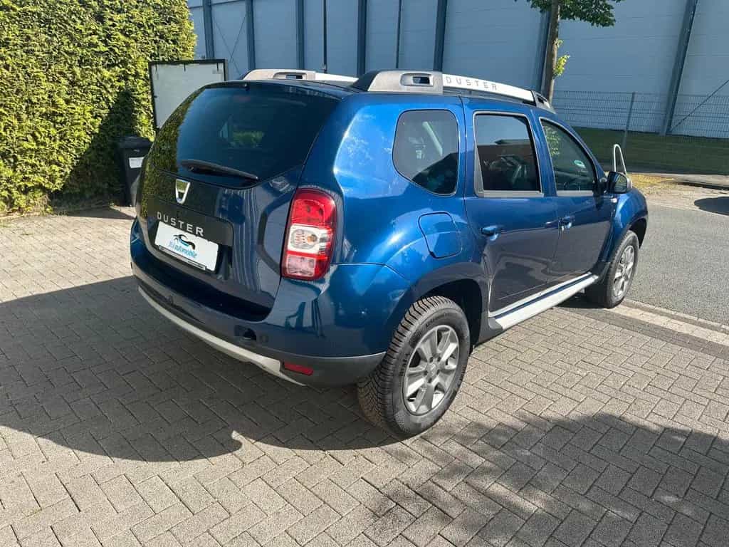 Dacia Duster I Celebration 4x2 * 1 Hand* Garantie 10/2015-photo-4