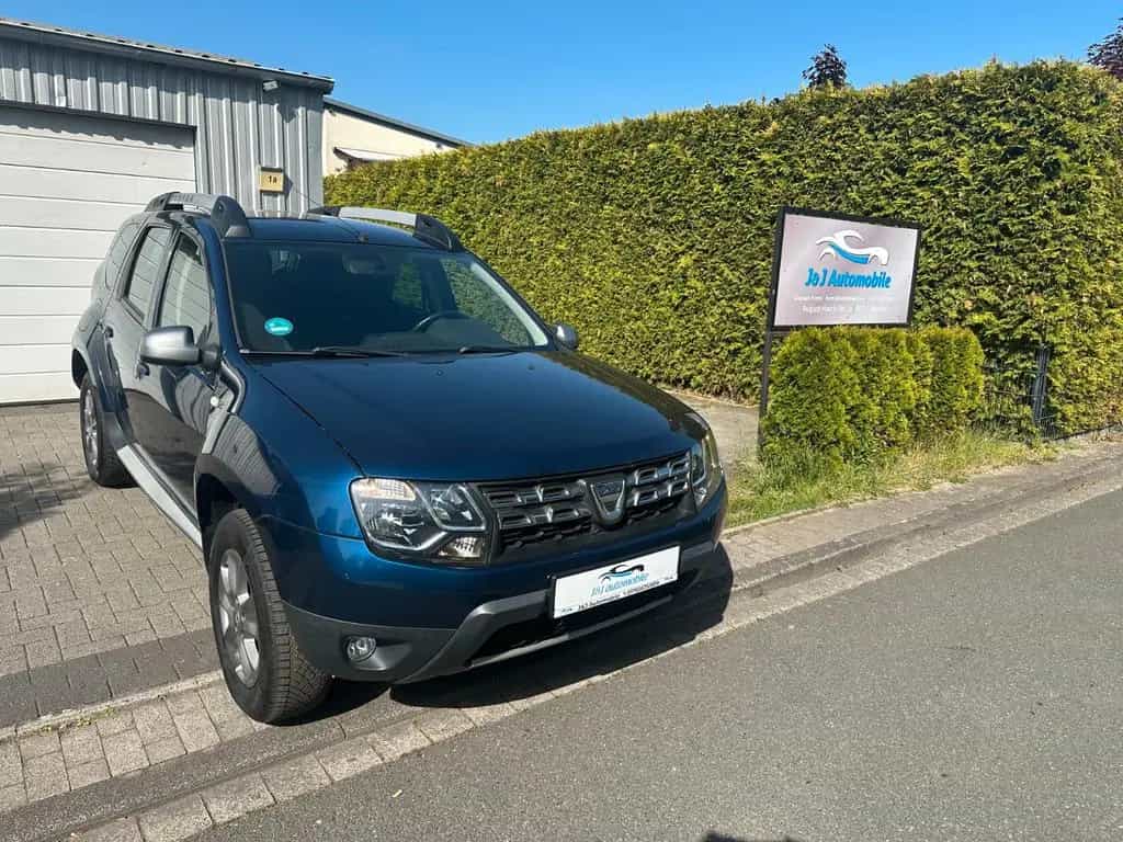 Dacia Duster I Celebration 4x2 * 1 Hand* Garantie 10/2015-photo-6