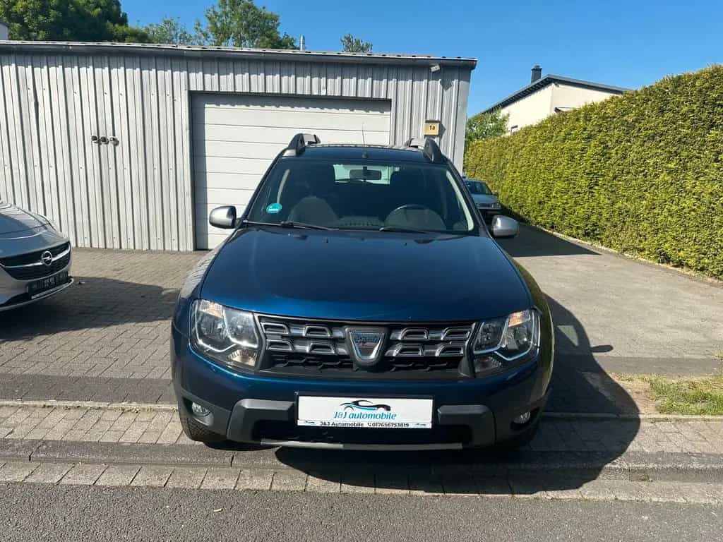 Dacia Duster I Celebration 4x2 * 1 Hand* Garantie 10/2015-photo-7