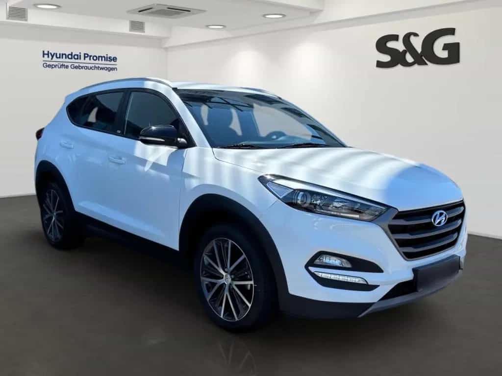 Hyundai TUCSON 1.6 Passion* Navi*DAB*SHZ*Lenkrad-HZG*Tot 02/2018-photo-1
