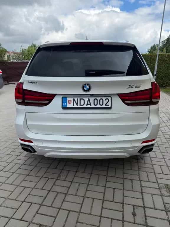 BMW X5 xDrive50i - 03/2014-photo-5