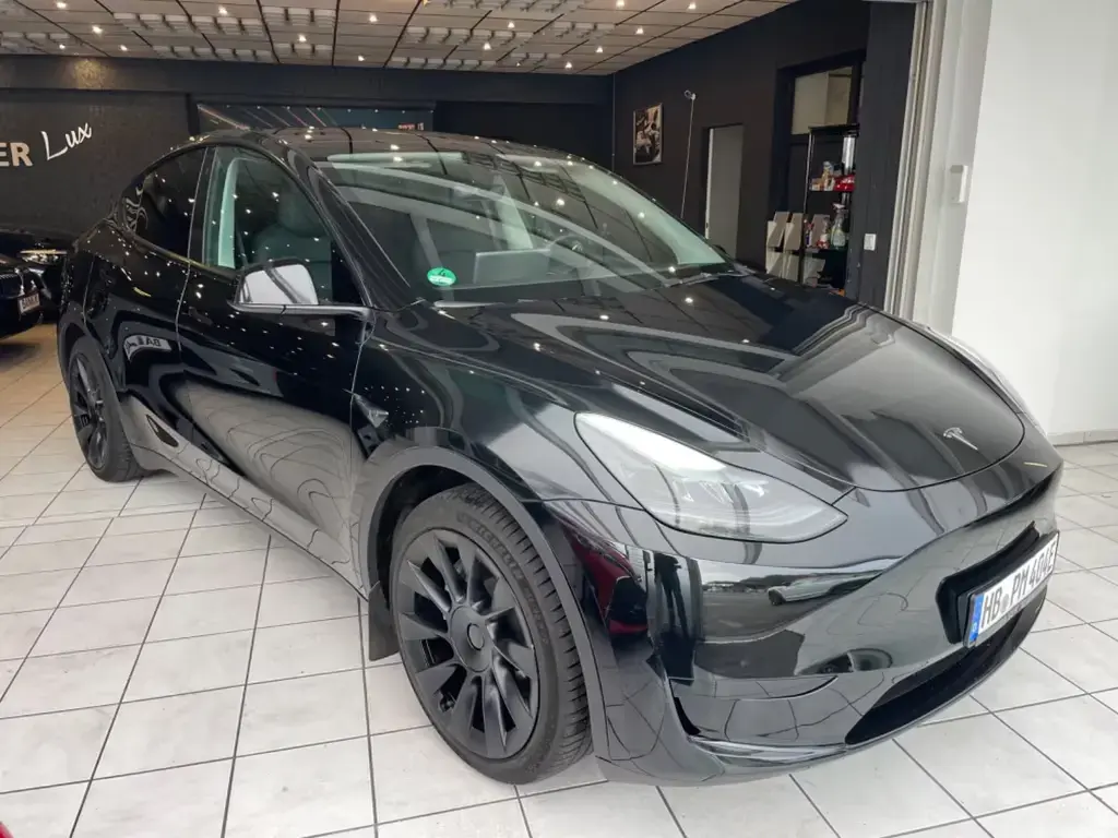 Main__Slider__Photo:Tesla Model Y Basis RWD Garantie 1.Hand 03/2023-1