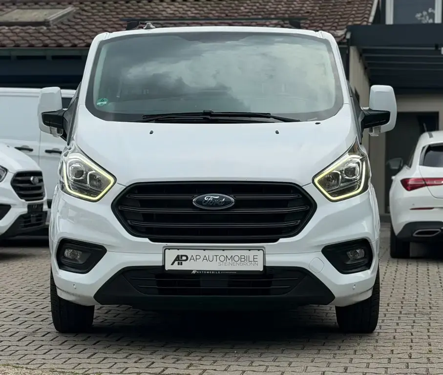 Main__Slider__Photo:Ford Transit Custom Kombi 9-Sitzer 1H/Navi/AHK/HU neu 10/2019-1