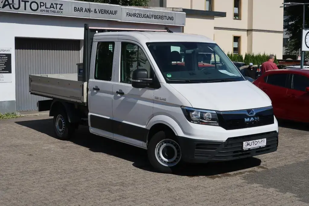 Main__Slider__Photo:MAN TGE 3.140 Pritsche *7-SITZER *KLIMA *AHK 04/2021-1