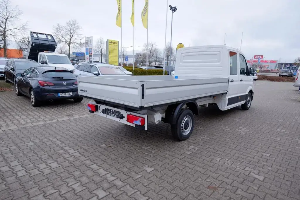 Main__Slider__Photo:MAN TGE 3.140 Doka L4 Pritsche/Kam/PDC/AppC/Temp null-1