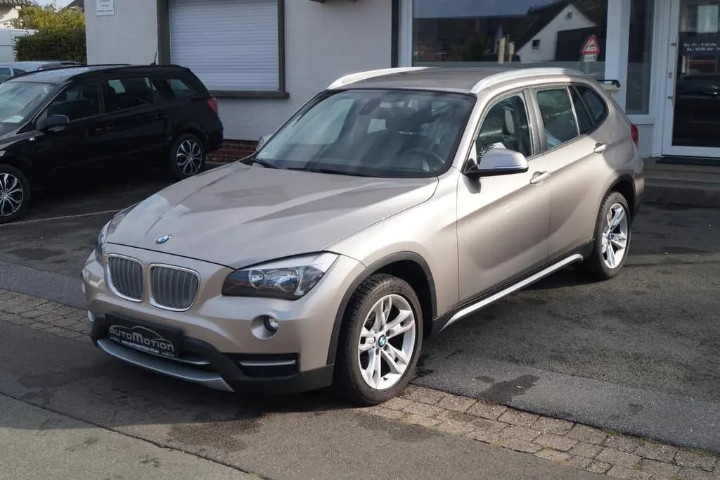 Main__Slider__Photo:BMW X1 20 i sDrive*T.-Leder*Klimaaut.*PDC*SHZ*MFL* 07/2013-0