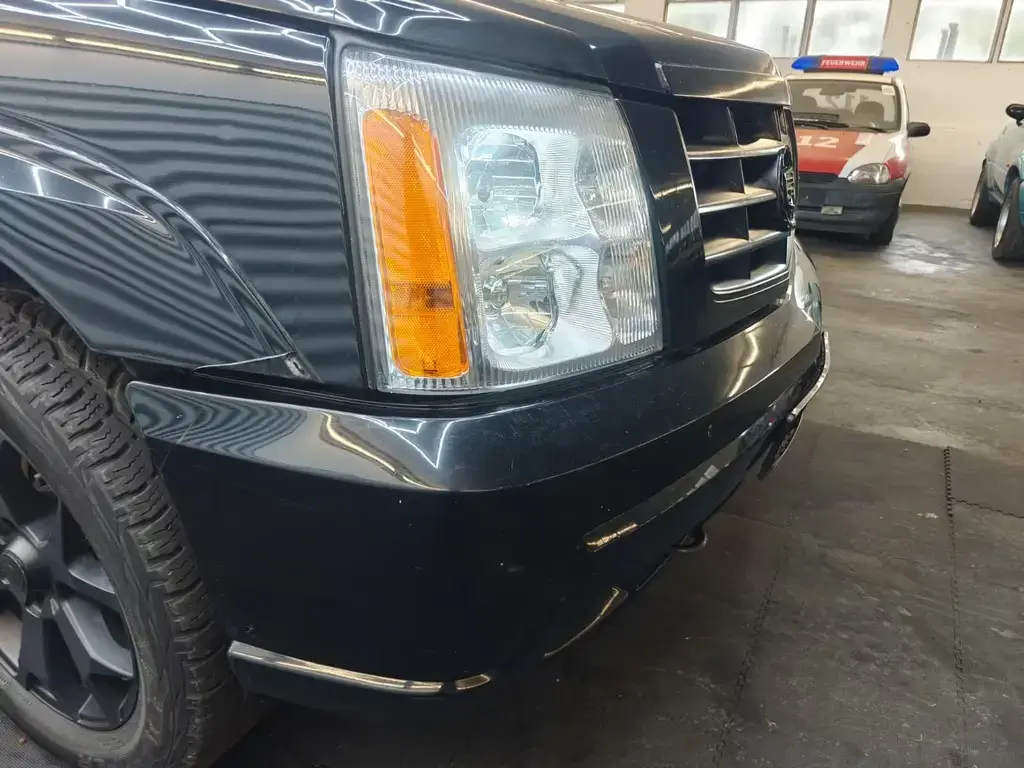 Main__Slider__Photo:Cadillac Escalade GMT800 6.0 V8 4x4 Klimaautomatik Leder 07/2002-1