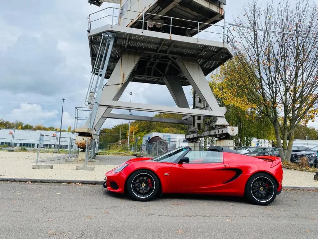 Main__Slider__Photo:Lotus Elise Sport 220 / 1. Hand / Scheckheft 06/2022-0