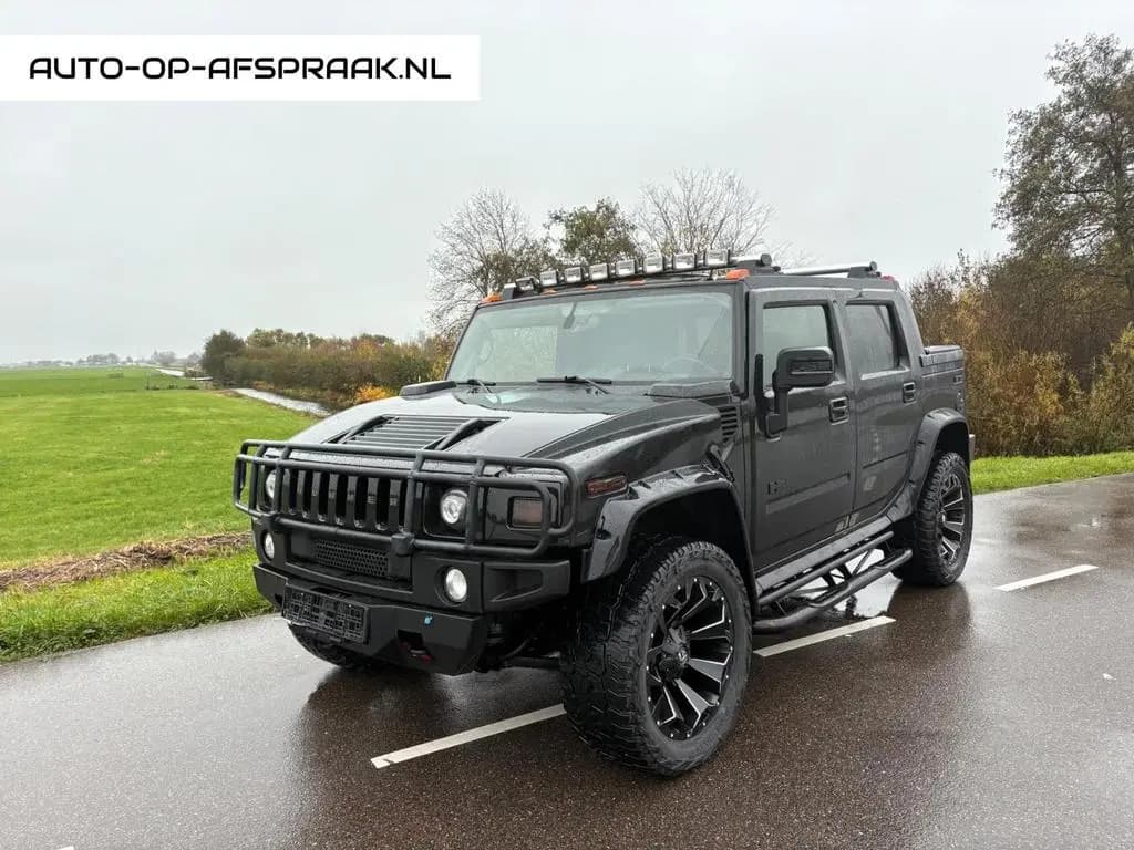 Main__Slider__Photo:Hummer H2 6.0 SUT Black Ops edition 09/2006-0