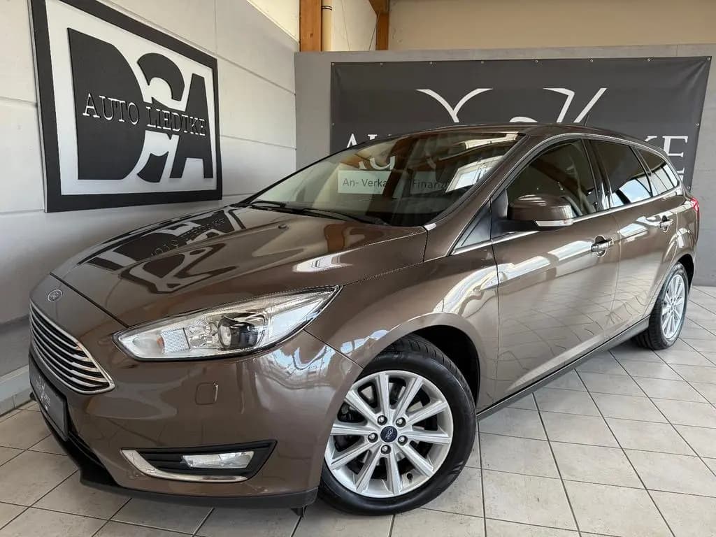 Main__Slider__Photo:Ford Focus Turnier 1.5 Titanium/Navi/Sitzhz./AHK/TÜV 03/2018-0