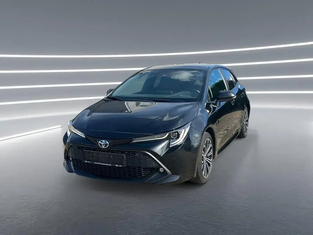Main__Slider__Photo:Toyota Corolla 1.8 l Hybrid 5-Türer Team D 2xKlima ACC 10/2022-1