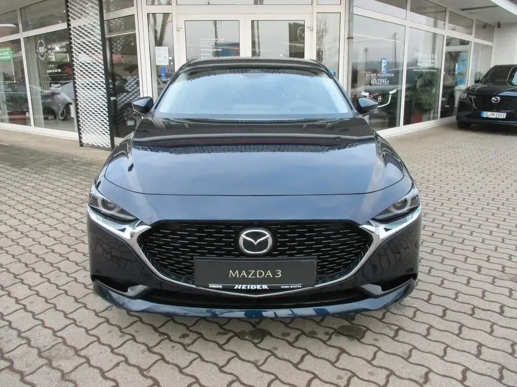 Main__Slider__Photo:Mazda 3 4SN 2.5L e-SKYACTIV G 140 6AT Exclusive-Line 02/2026-1