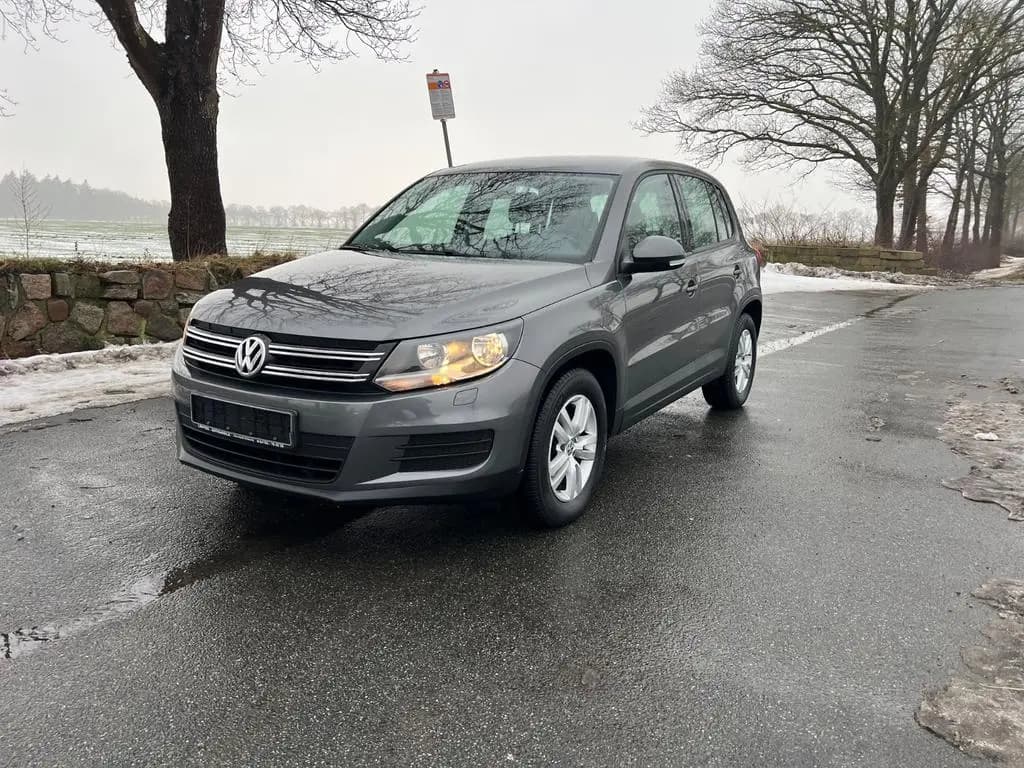 Main__Slider__Photo:Volkswagen Tiguan Trend & Fun 1.Hand 87000km Scheckheft 07/2014-0