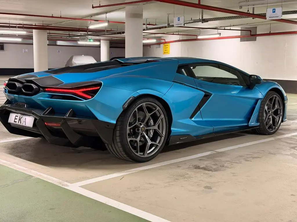 Main__Slider__Photo:Lamborghini Revuelto 6.5 V12 HPEV - 2026 - carbon - %%% null-1