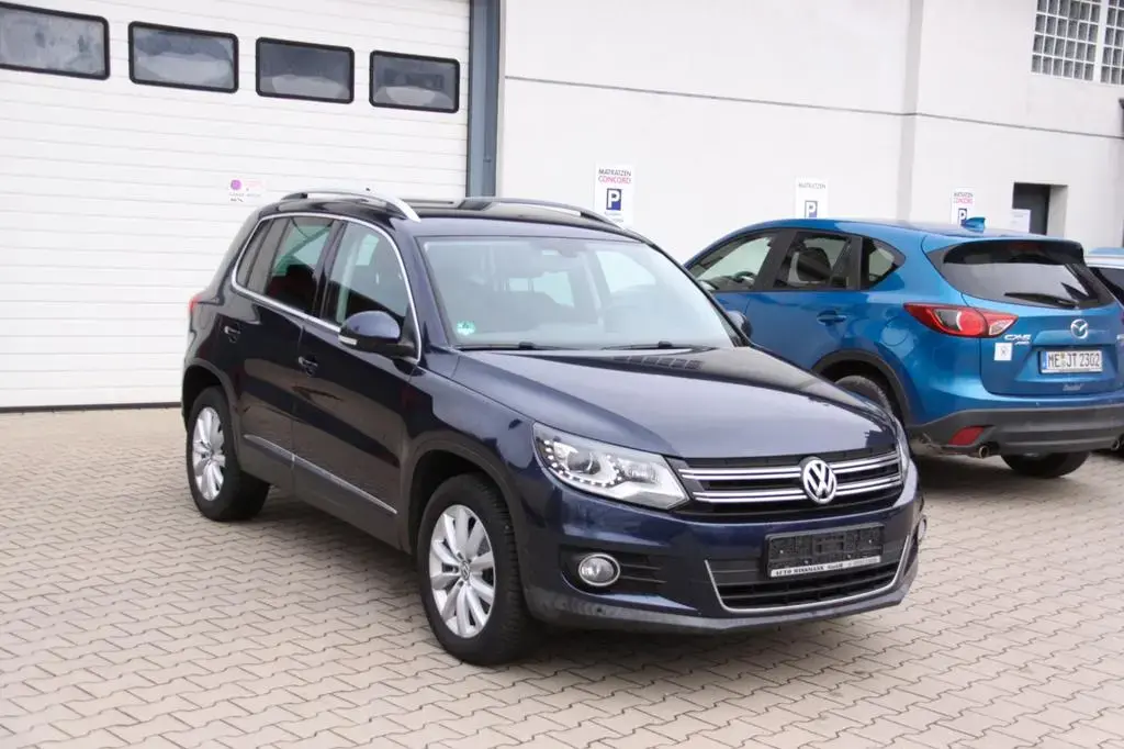 Main__Slider__Photo:Volkswagen Tiguan Sport & Style 4Motion 11/2014-1