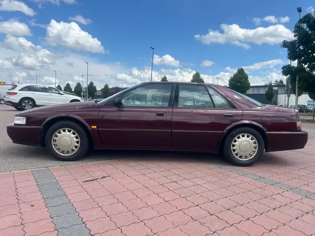Main__Slider__Photo:Cadillac STS Seville 09/1992-0