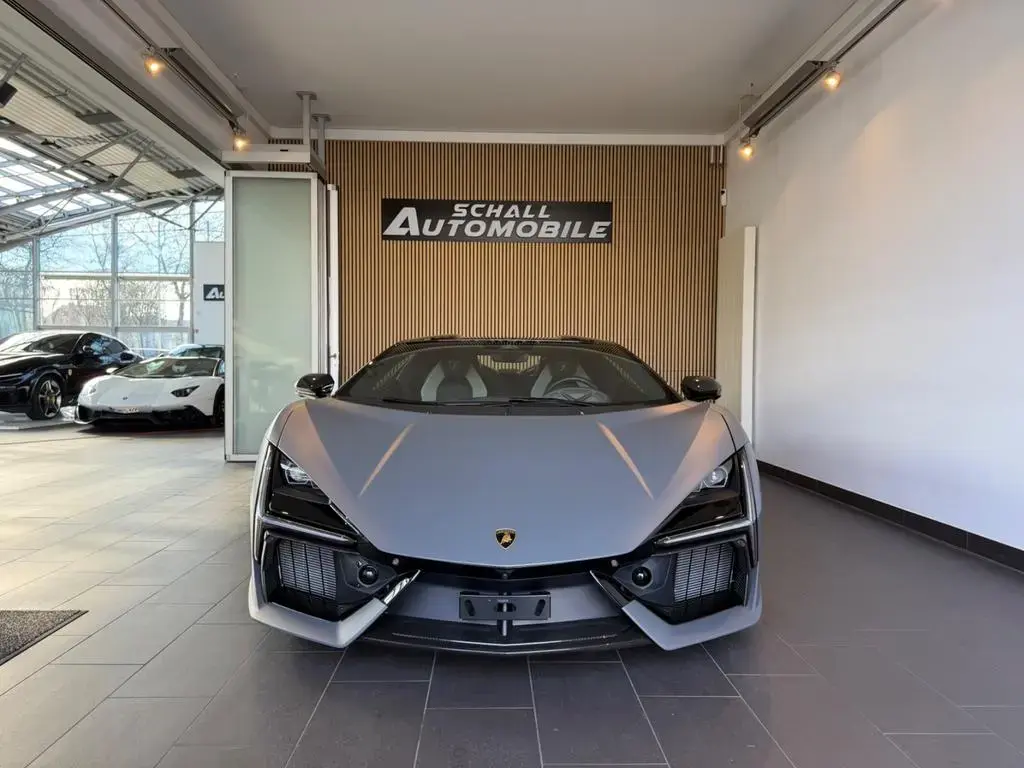 Main__Slider__Photo:Lamborghini Revuelto 6.5 V12 MY25/Grigio Vulcano/CARBON/VOLL 02/2026-1
