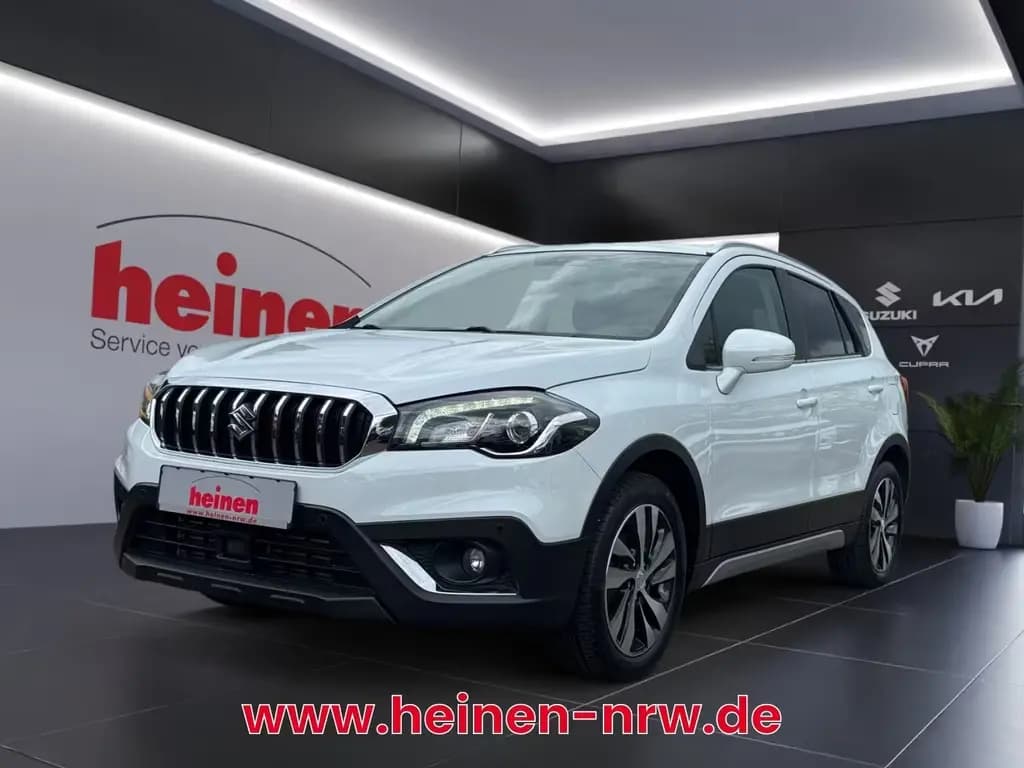 Main__Slider__Photo:Suzuki (SX4) S-Cross S-Cross 1.4 Comfort+ 4WD RÜCKFAHRKAMERA+NAVI+AHK 10/2021-0
