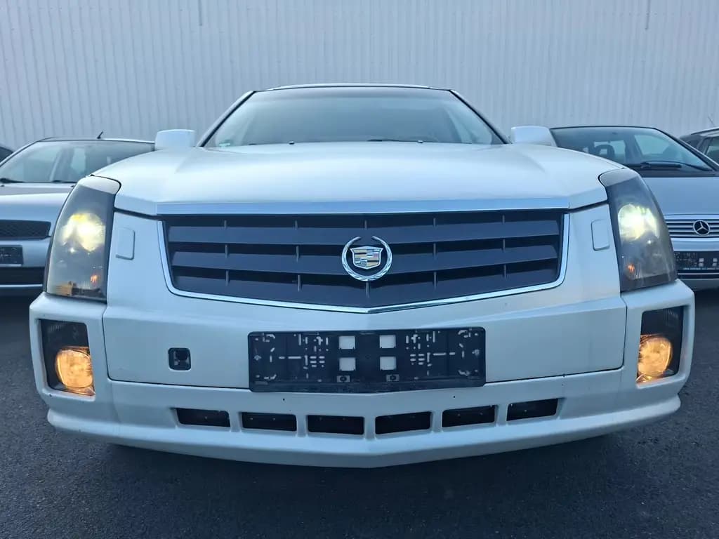 Main__Slider__Photo:Cadillac SRX 4.6 V8 Sport Luxury, 7 Sitzer, LPG-Gas, Lede 10/2004-0