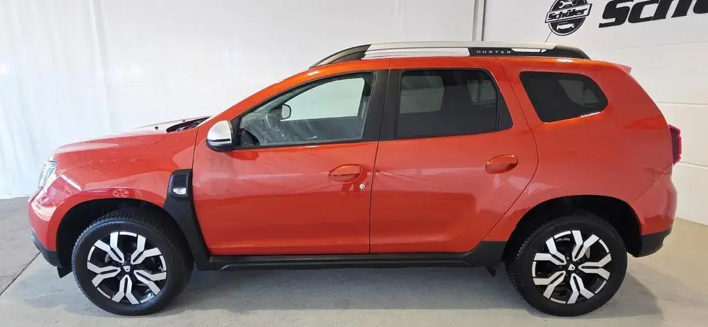 Main__Slider__Photo:Dacia Duster II Prestige+NAVI+KAMERA+SHZ+KLIMA+DSG-Aut 10/2021-1