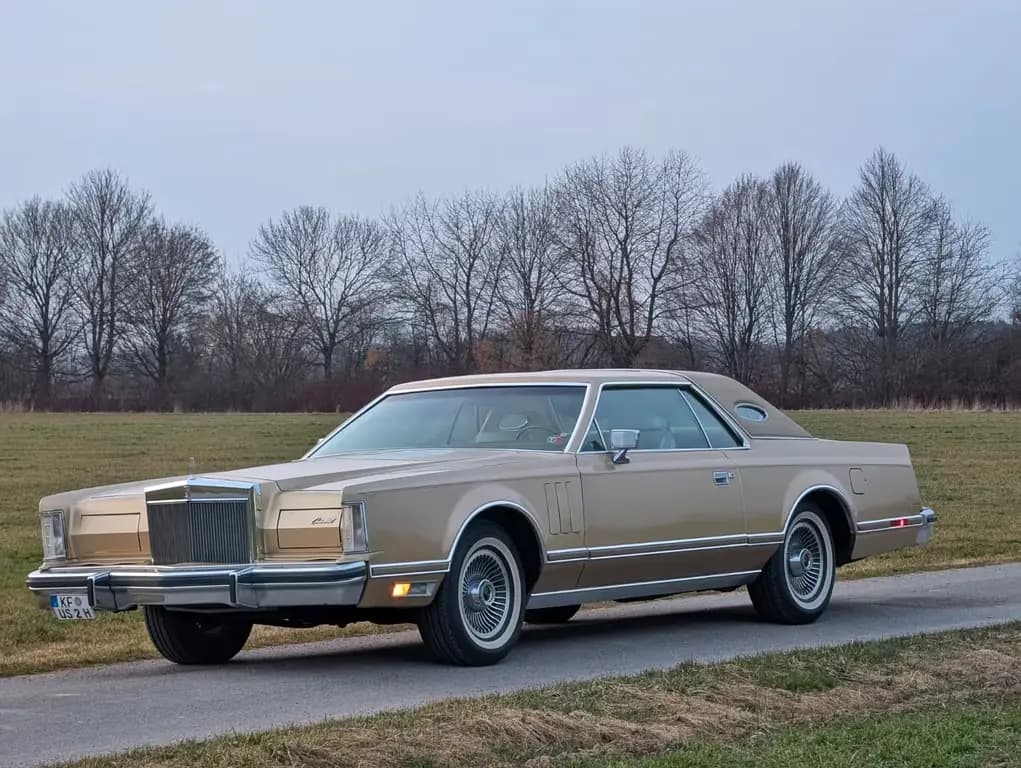 Main__Slider__Photo:Lincoln Continental 6.6l Coupe Gold - Cartier Uhr/H Zul. 07/1979-0
