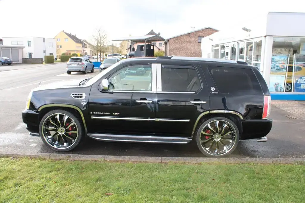 Main__Slider__Photo:Cadillac Escalade 6,2l V8 Autom. LPG Prins, DAB Navi, 26" 01/2007-1