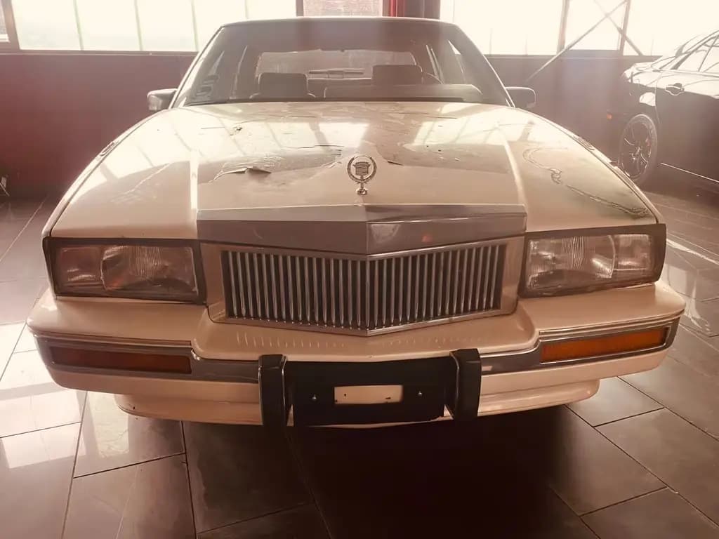Main__Slider__Photo:Cadillac Seville STS V8 Deutsche Papiere 09/1990-0
