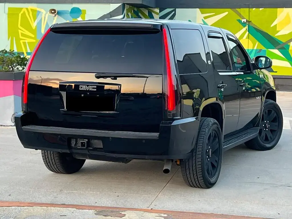 Main__Slider__Photo:GMC Yukon Hybrid 06/2009-1