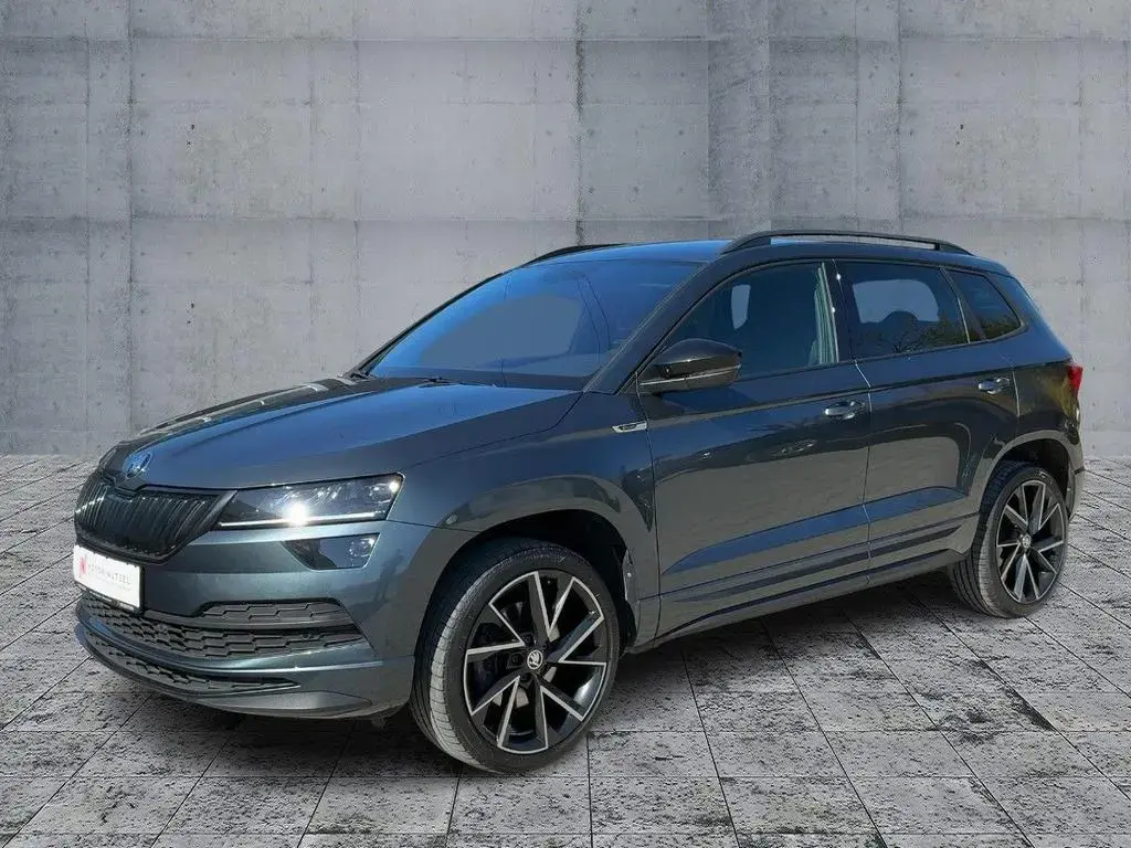 Main__Slider__Photo:Skoda Karoq 1.5 TSI DSG SPORTLINE LED+NAVI+APP+ACC+SHZ 03/2022-1